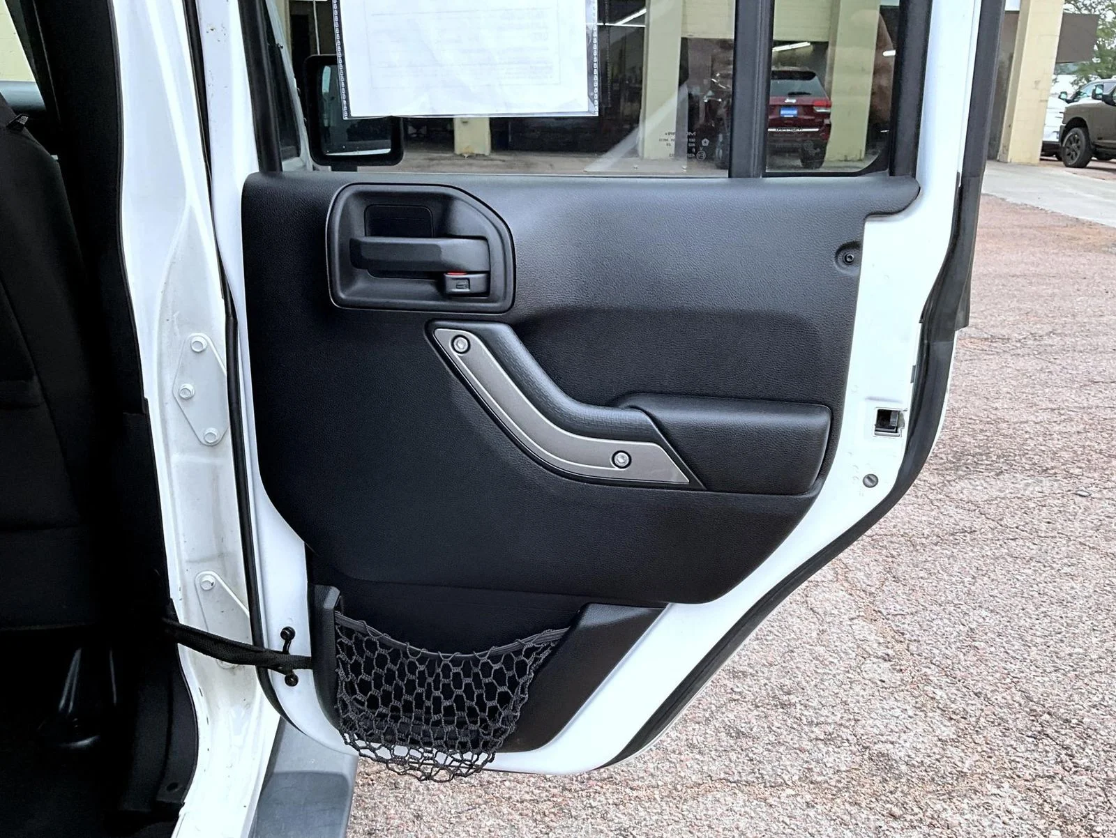 Used 2013 White Jeep Unlimited Sport image 19