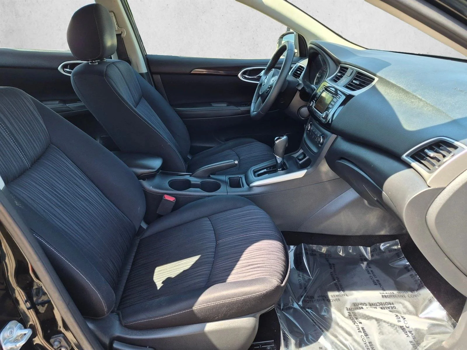Used 2017 Super Black Nissan SV image 19