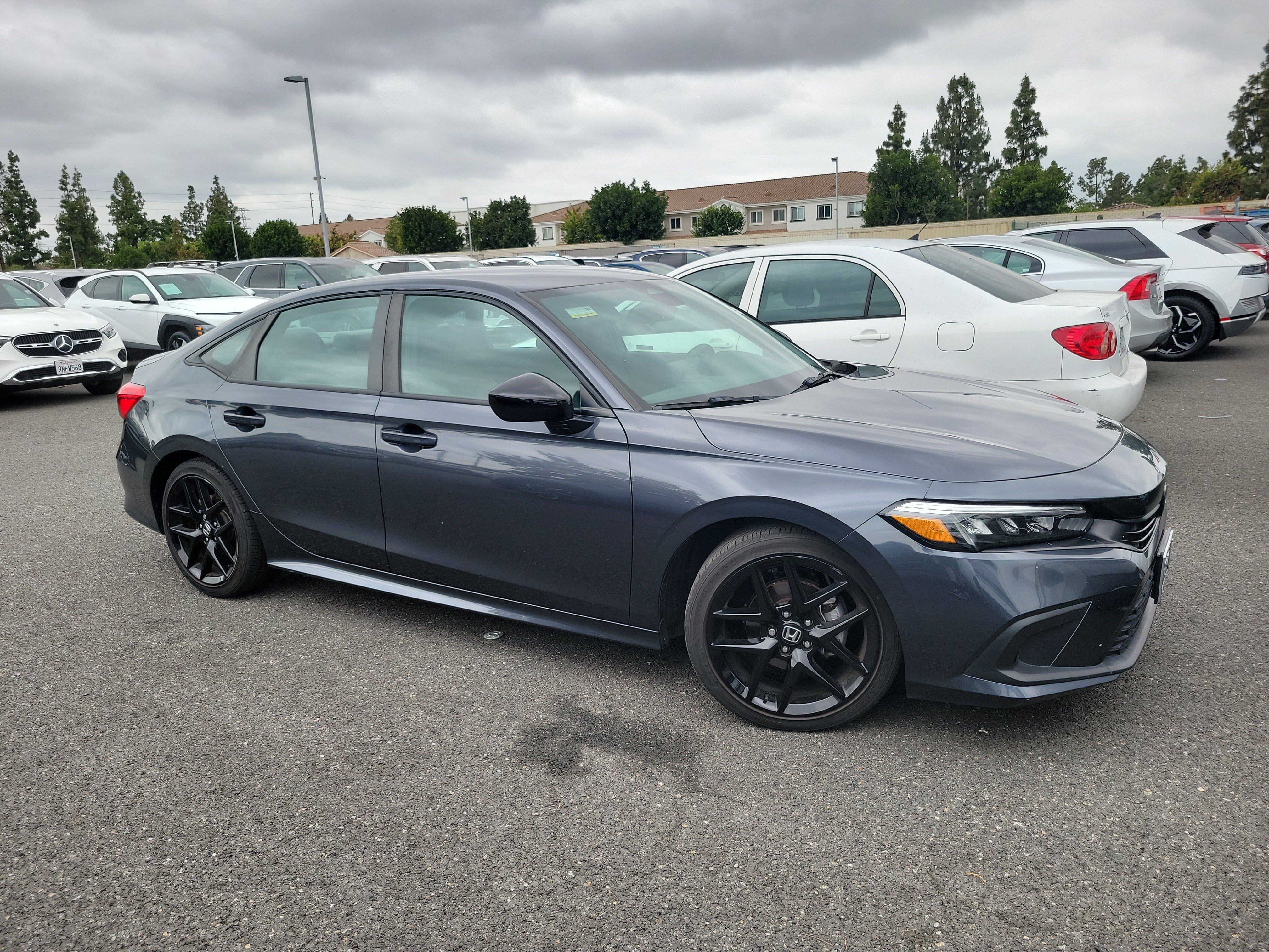 Used 2024 Meteorite Gray Metallic Honda Sport image 2