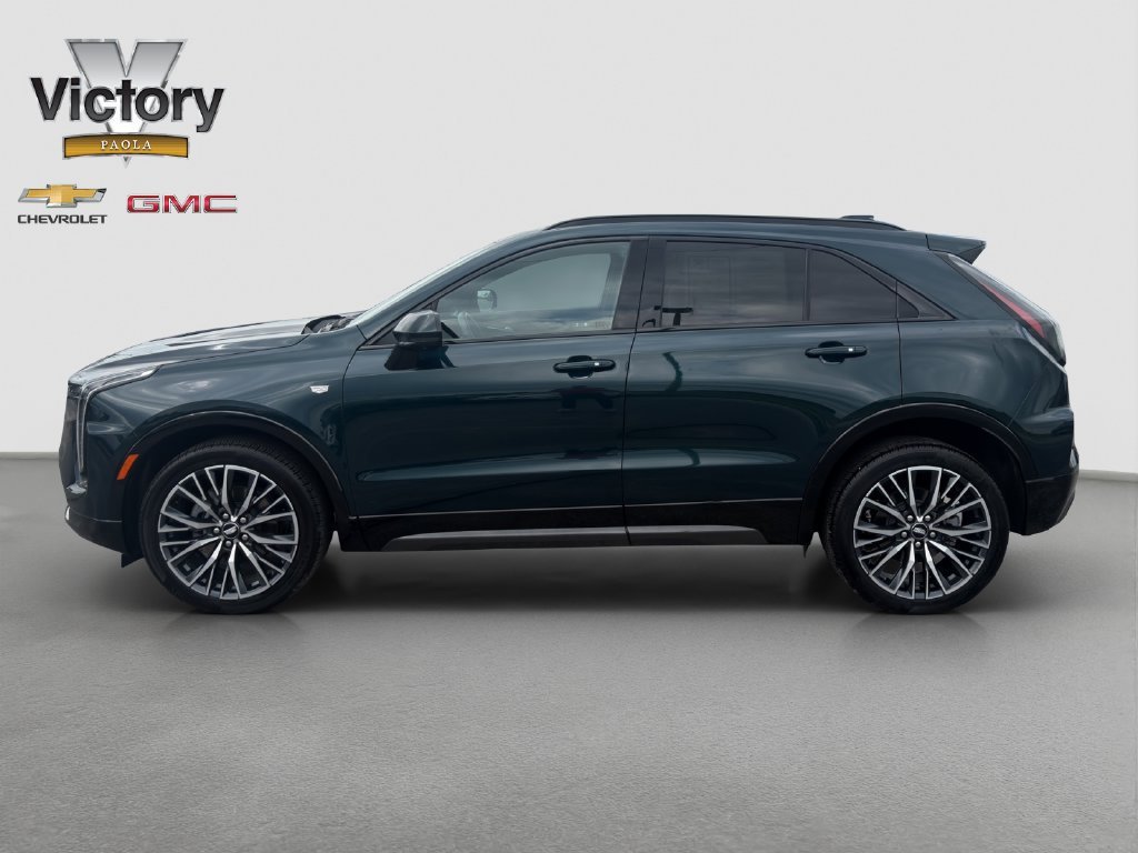 Used 2025 Emerald Lake Metallic Cadillac Sport image 3