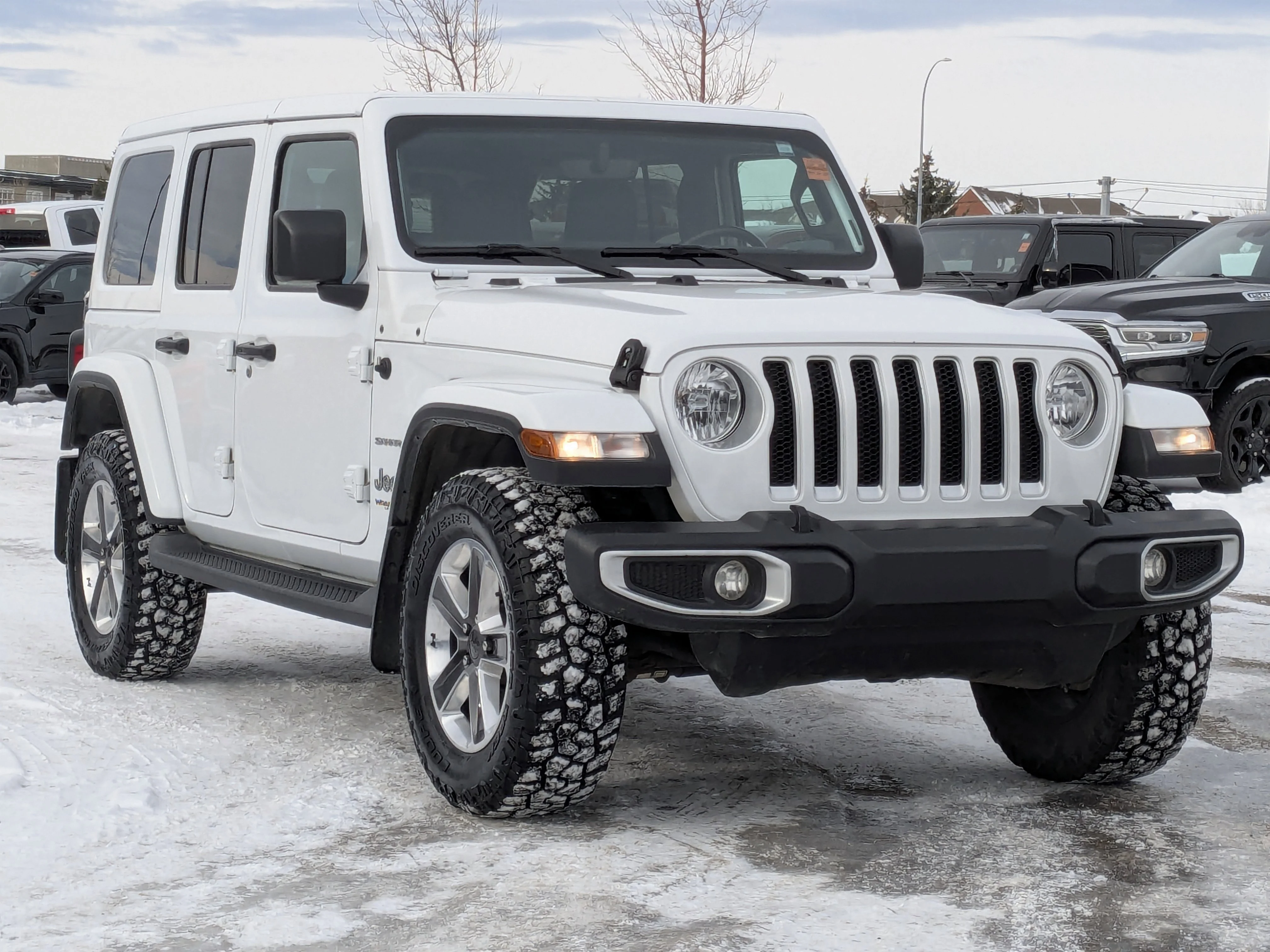 Used 2022 White Jeep Unlimited Sahara - Cold Weather Grp - Leather - Alpine Audio - Remote Start & More image 2