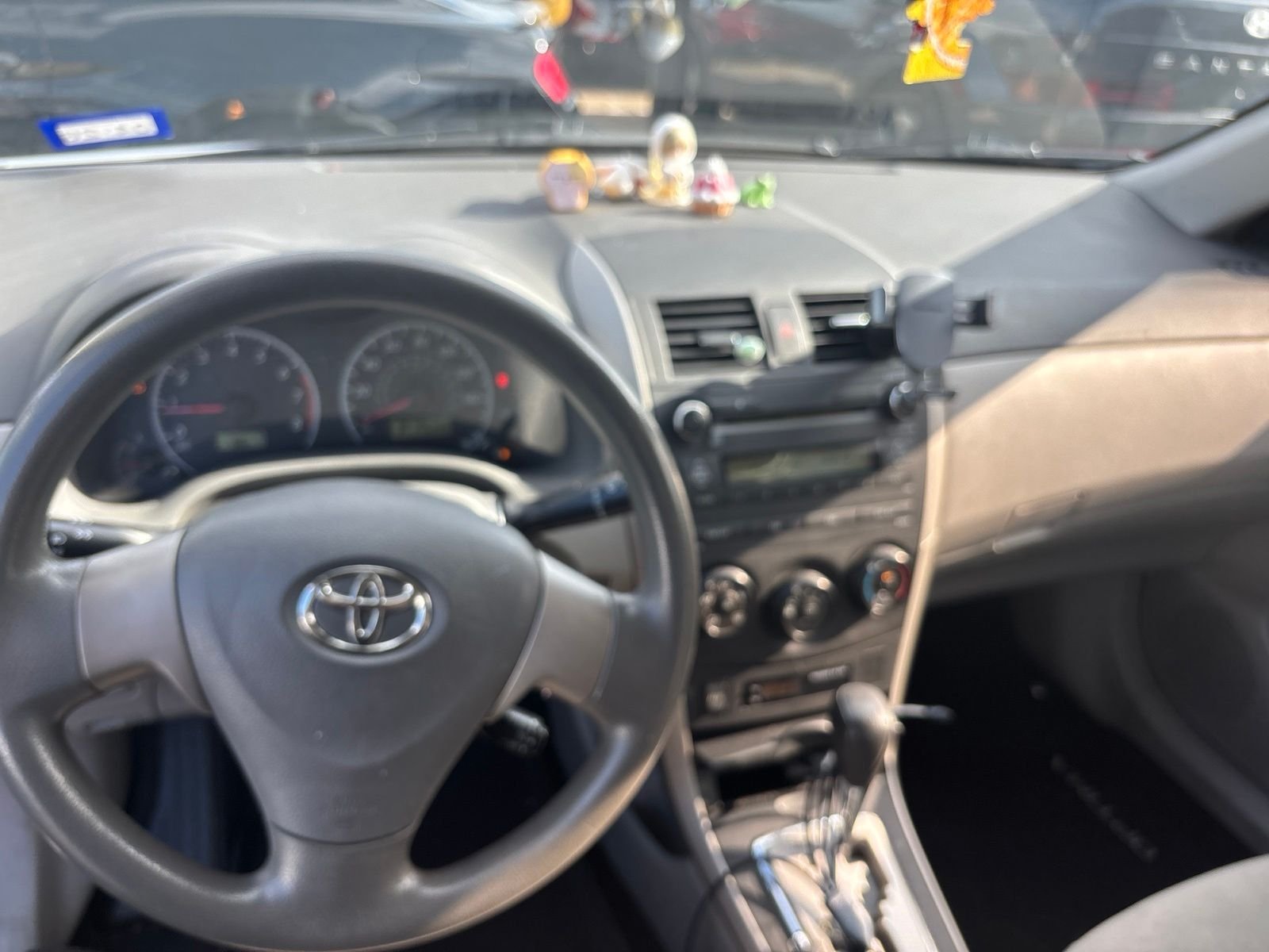Used 2010 Classic Silver Metallic Toyota LE image 6