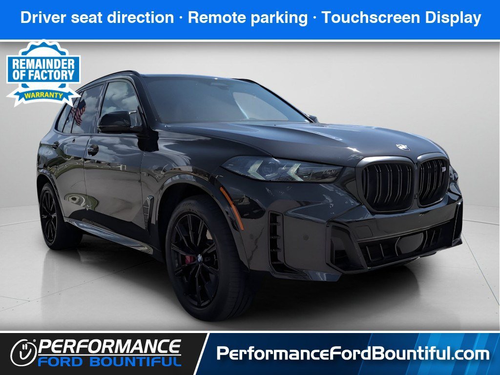 Used 2025 Black Sapphire Metallic BMW M60i image 1