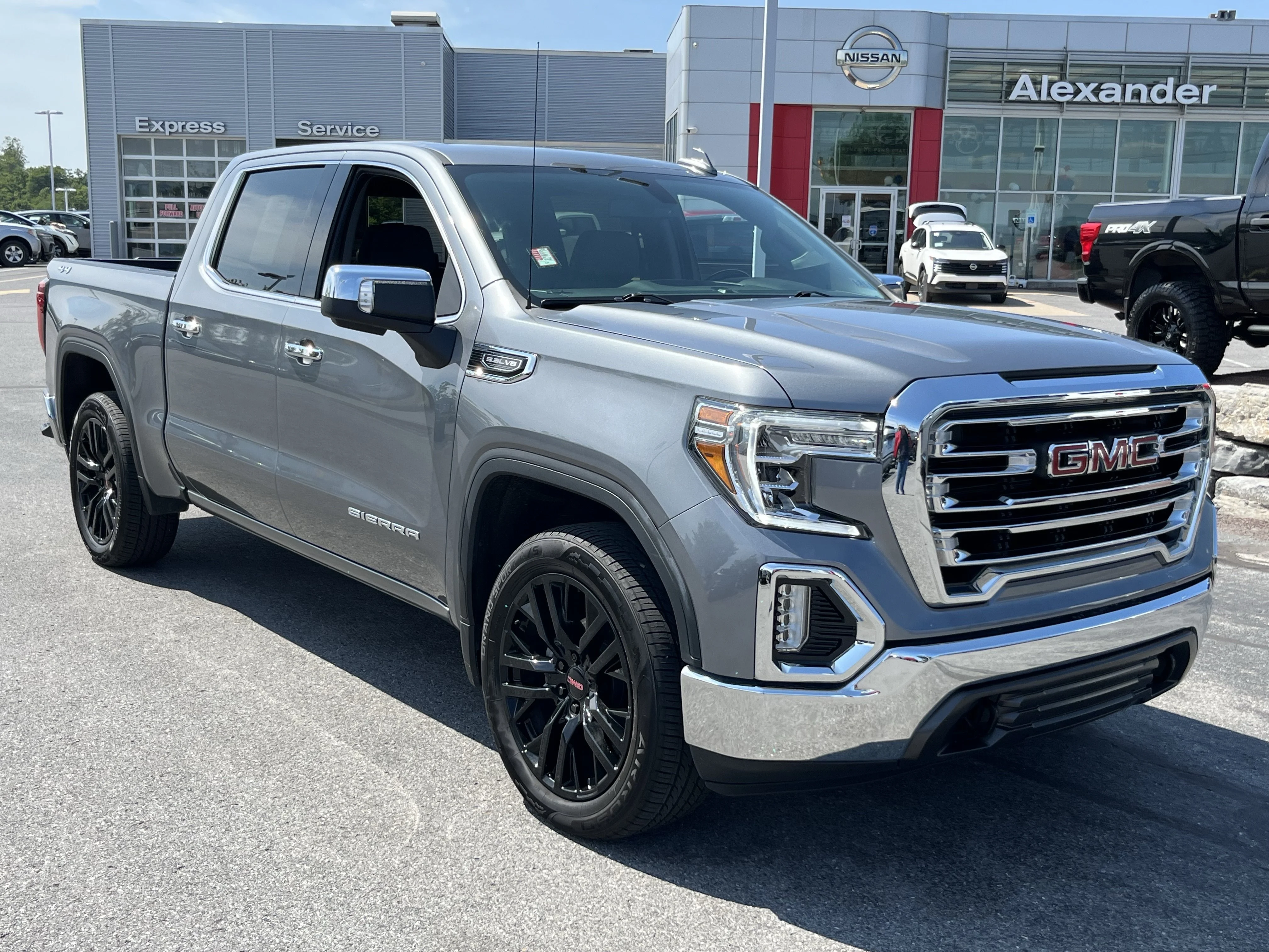 Used 2021 Steel Metallic GMC SLT image 1