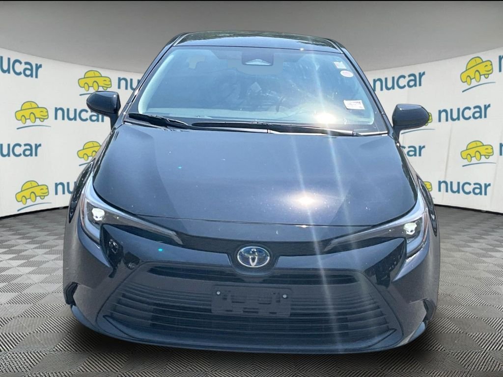 Used 2024 Black Toyota LE image 2