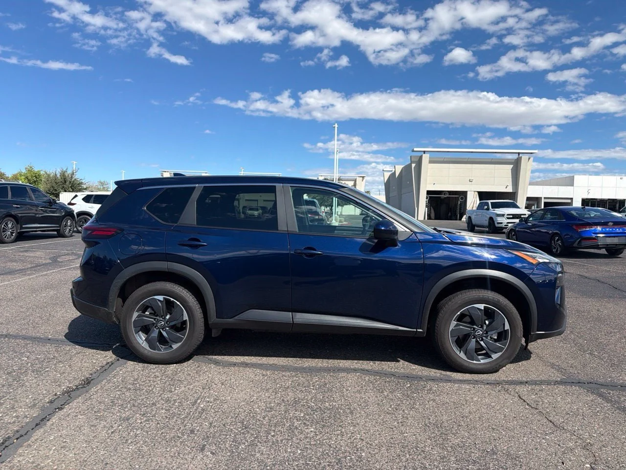 Used 2024 Deep Ocean Blue Pearl Nissan SV image 3