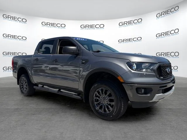 Certified Used 2021 Carbonized Gray Metallic Ford XLT image 1