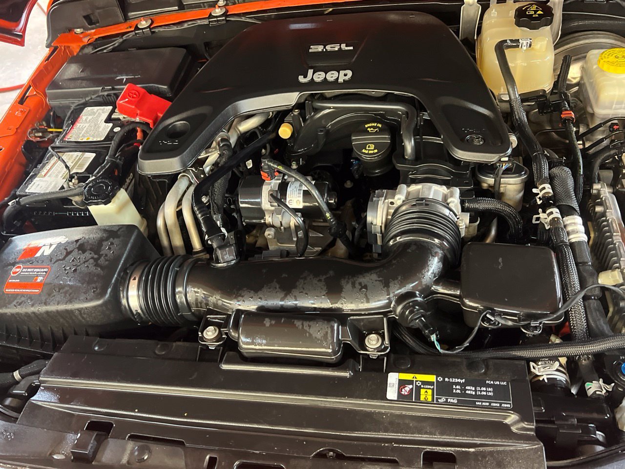 Used 2020 Orange Jeep Unlimited Sahara image 21
