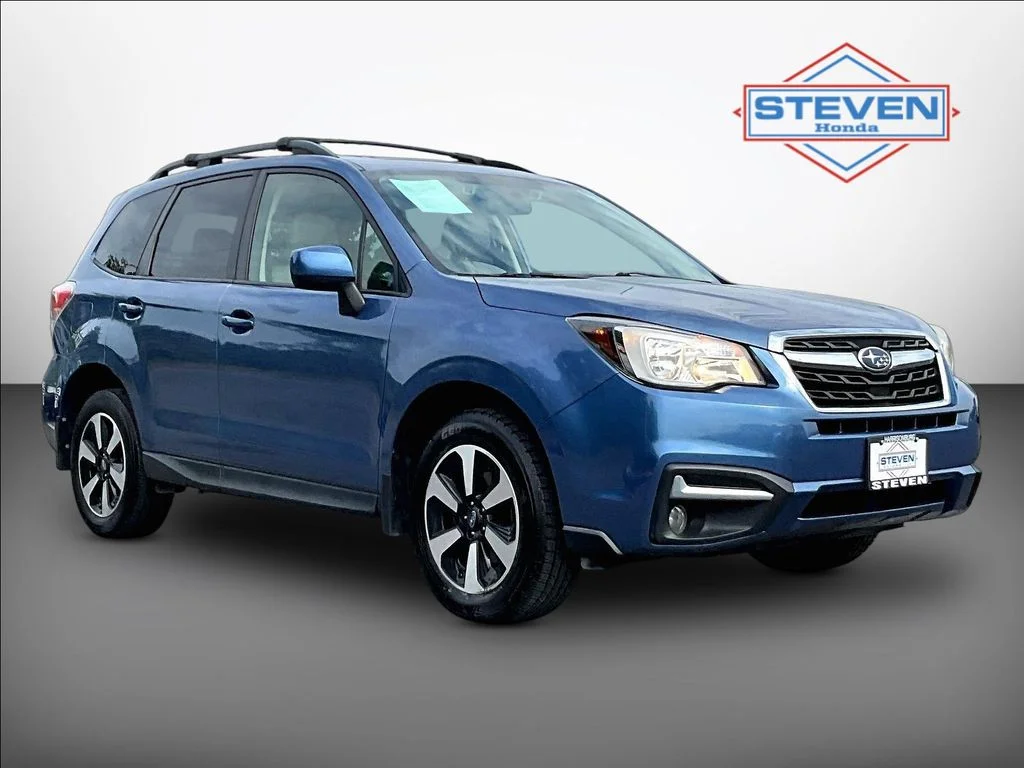 Used 2017 Quartz Blue Subaru 2.5i Premium image 1