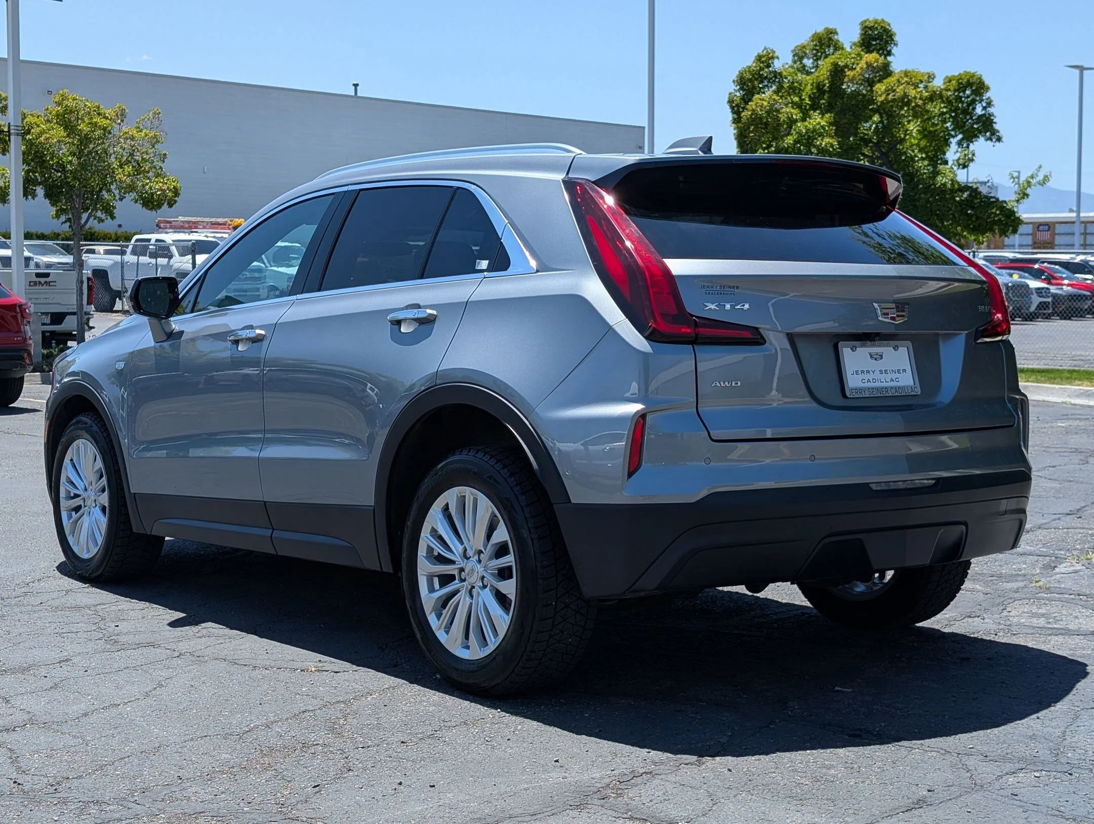 Used 2024 Argent Silver Metallic Cadillac AWD Luxury image 3