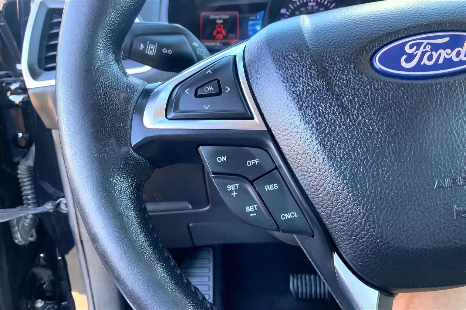 Certified Used 2022 Agate Black Metallic Ford SEL image 24