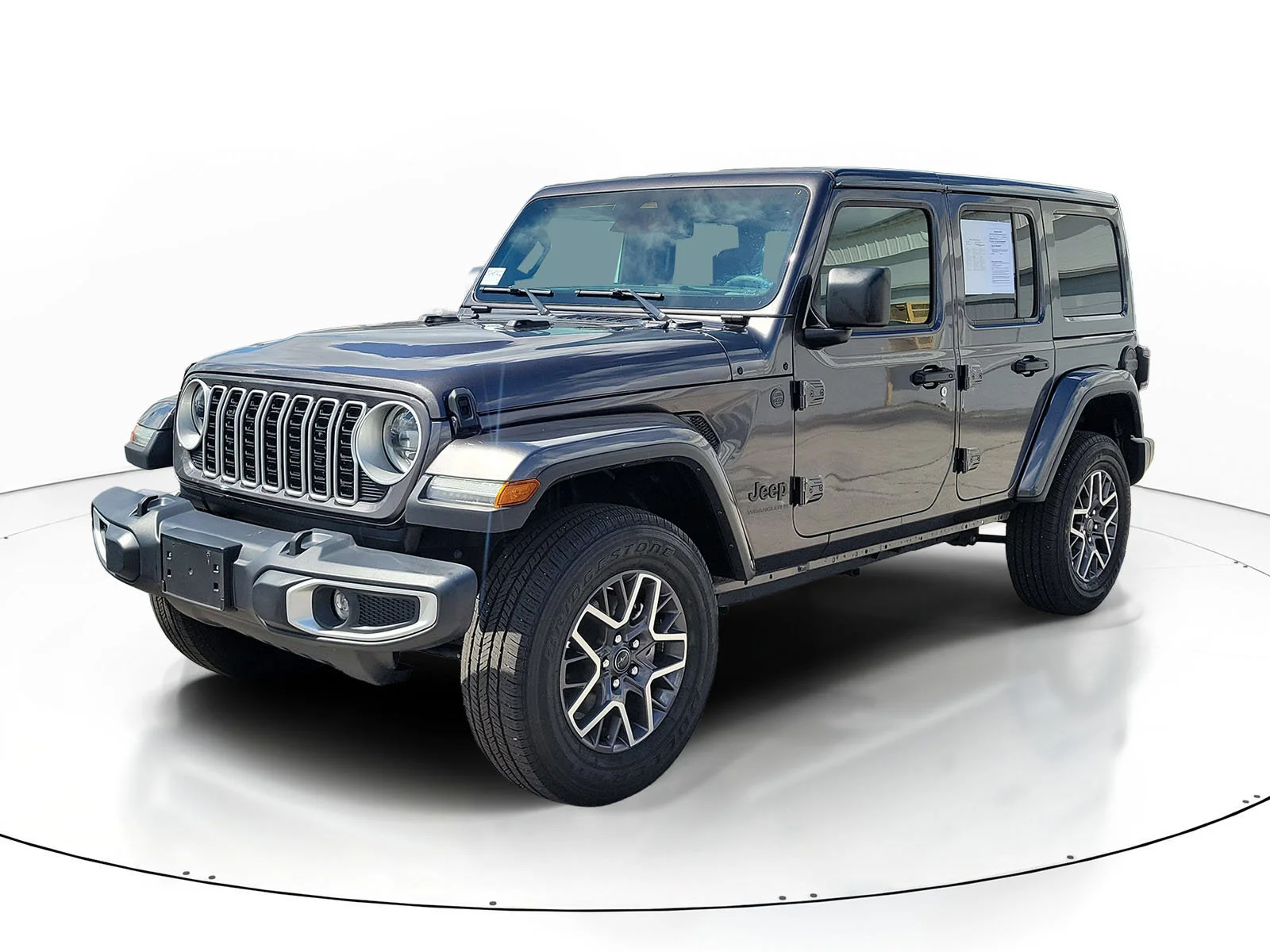 Used 2025 Granite Crystal Metallic Clearcoat Jeep Sahara image 3