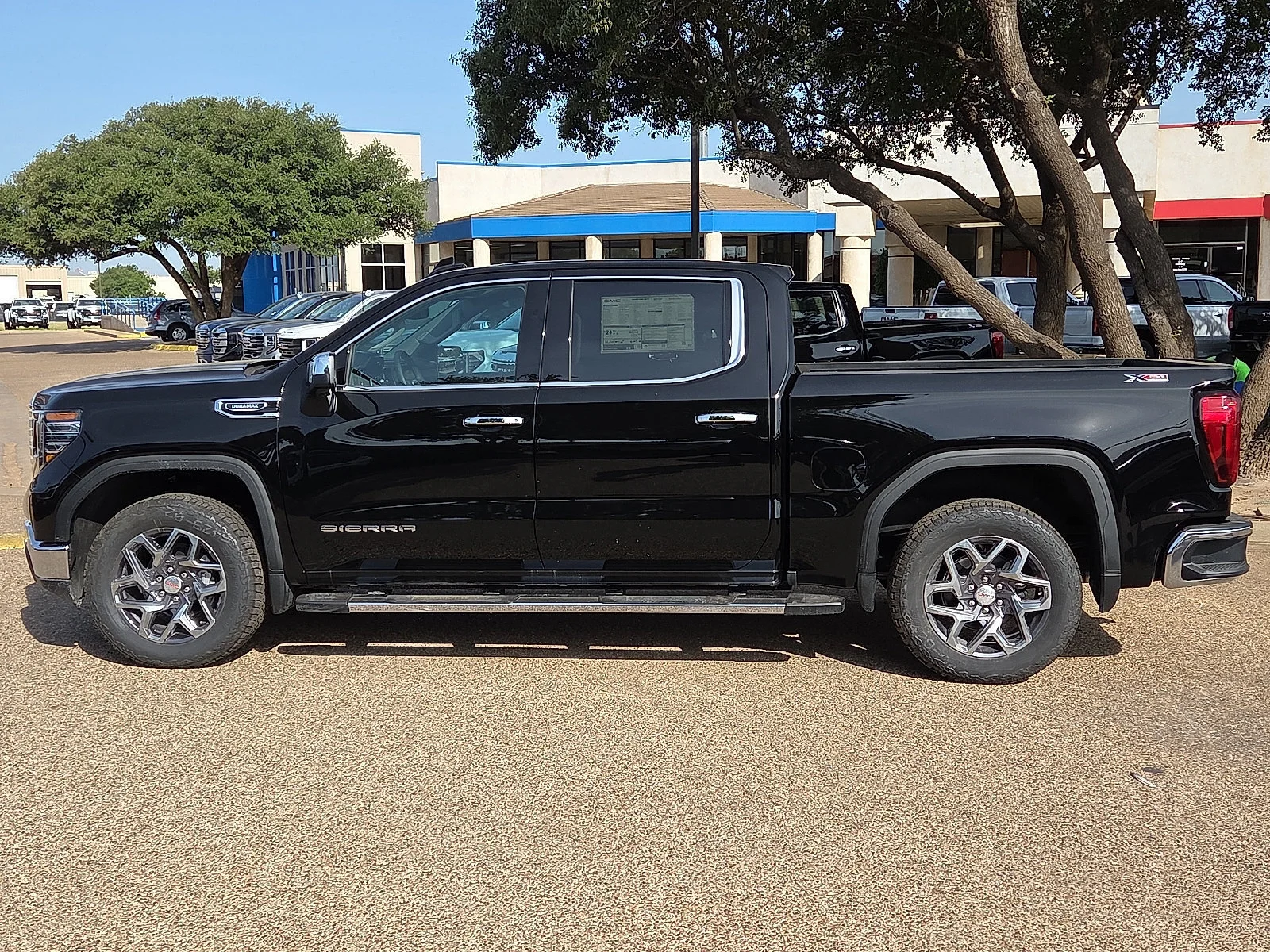 New 2026 Onyx Black GMC SLT image 2