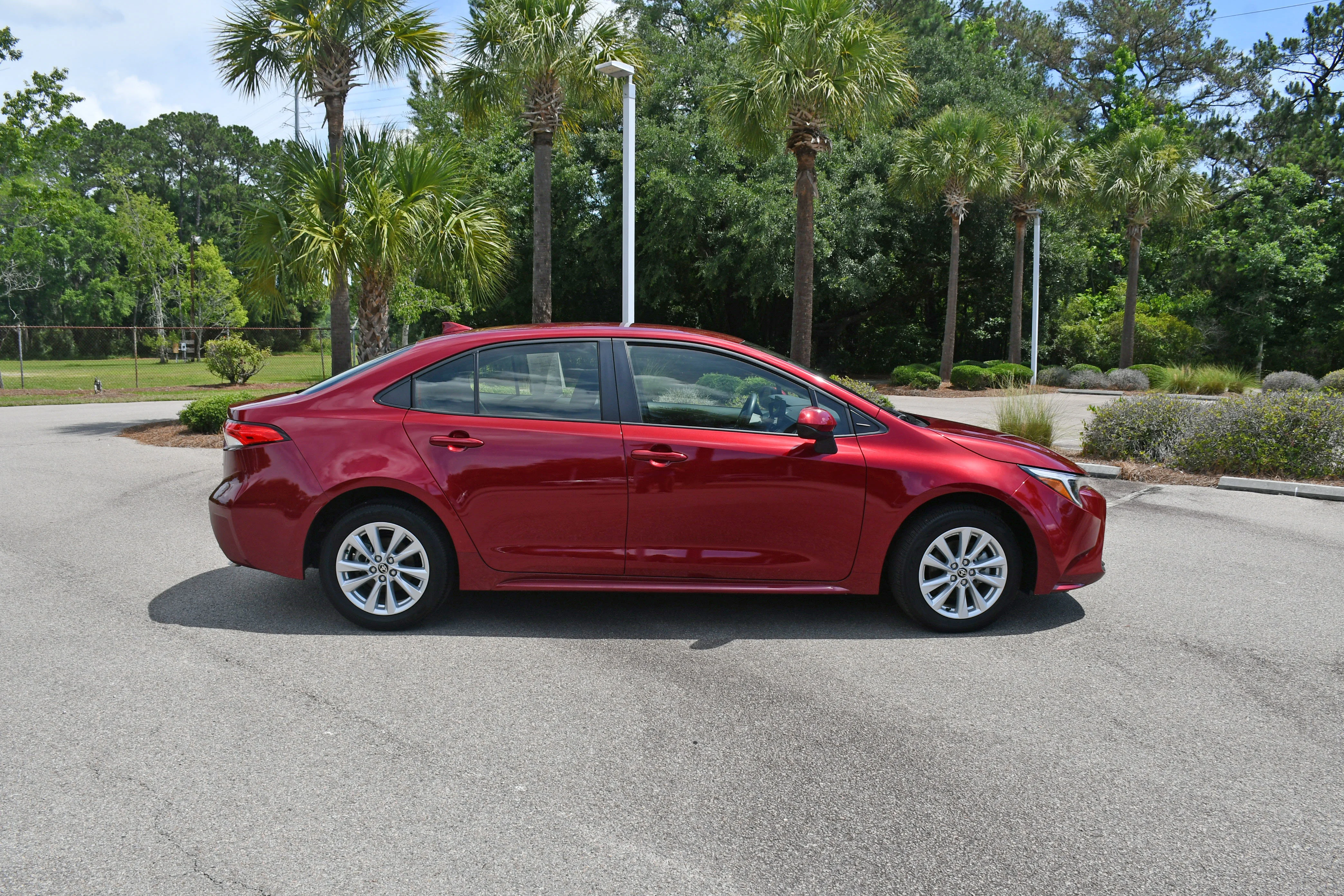 Used 2026 Red Toyota LE image 1