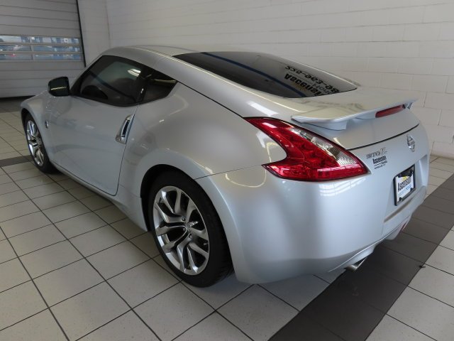 Used 2014 Brilliant Silver Metallic Nissan Base image 10