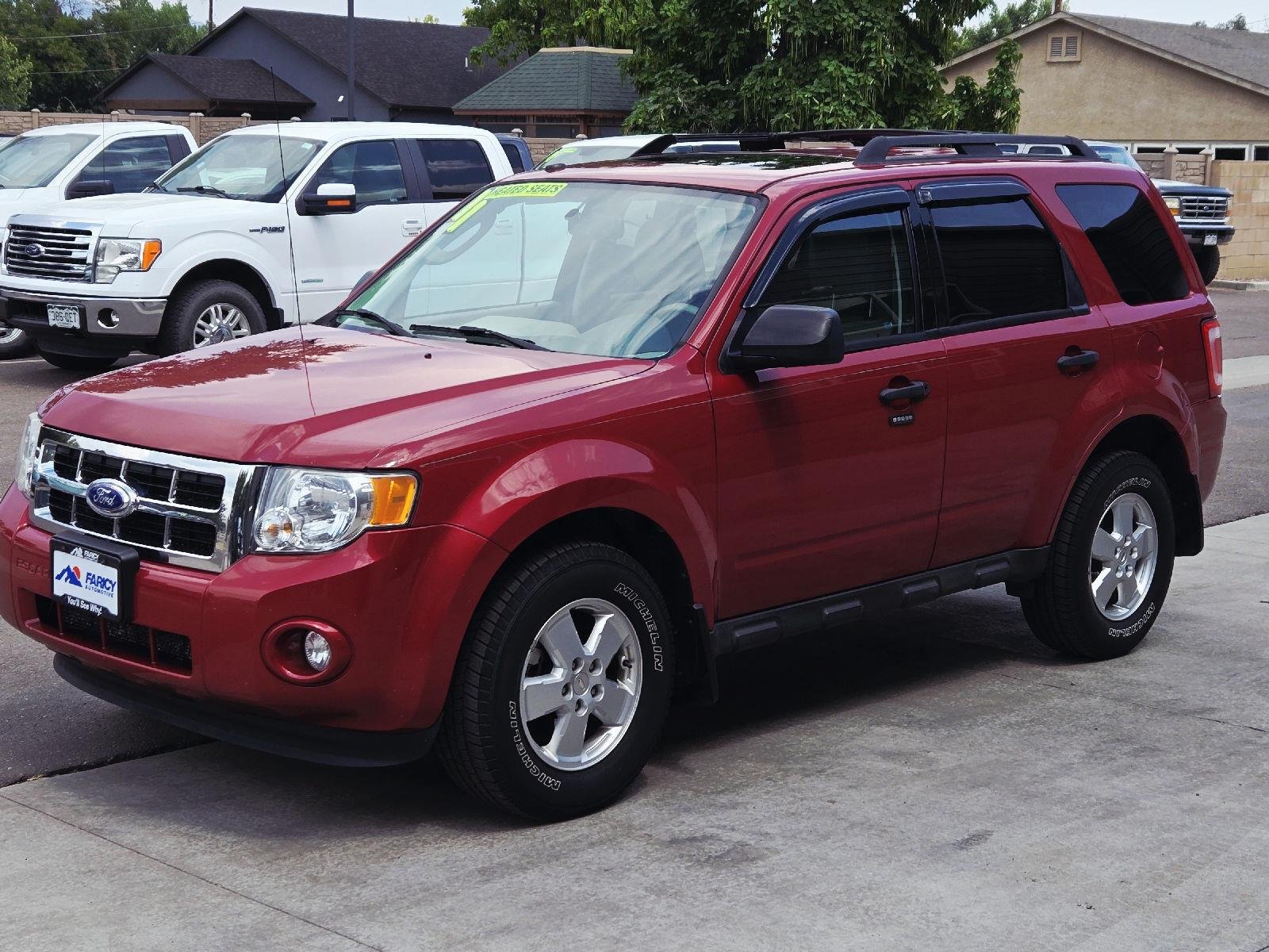 Used 2011 Sangria Red Metallic Ford XLT image 1