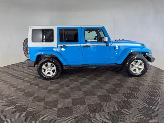 Used 2017 Blue Jeep Unlimited Sahara image 5