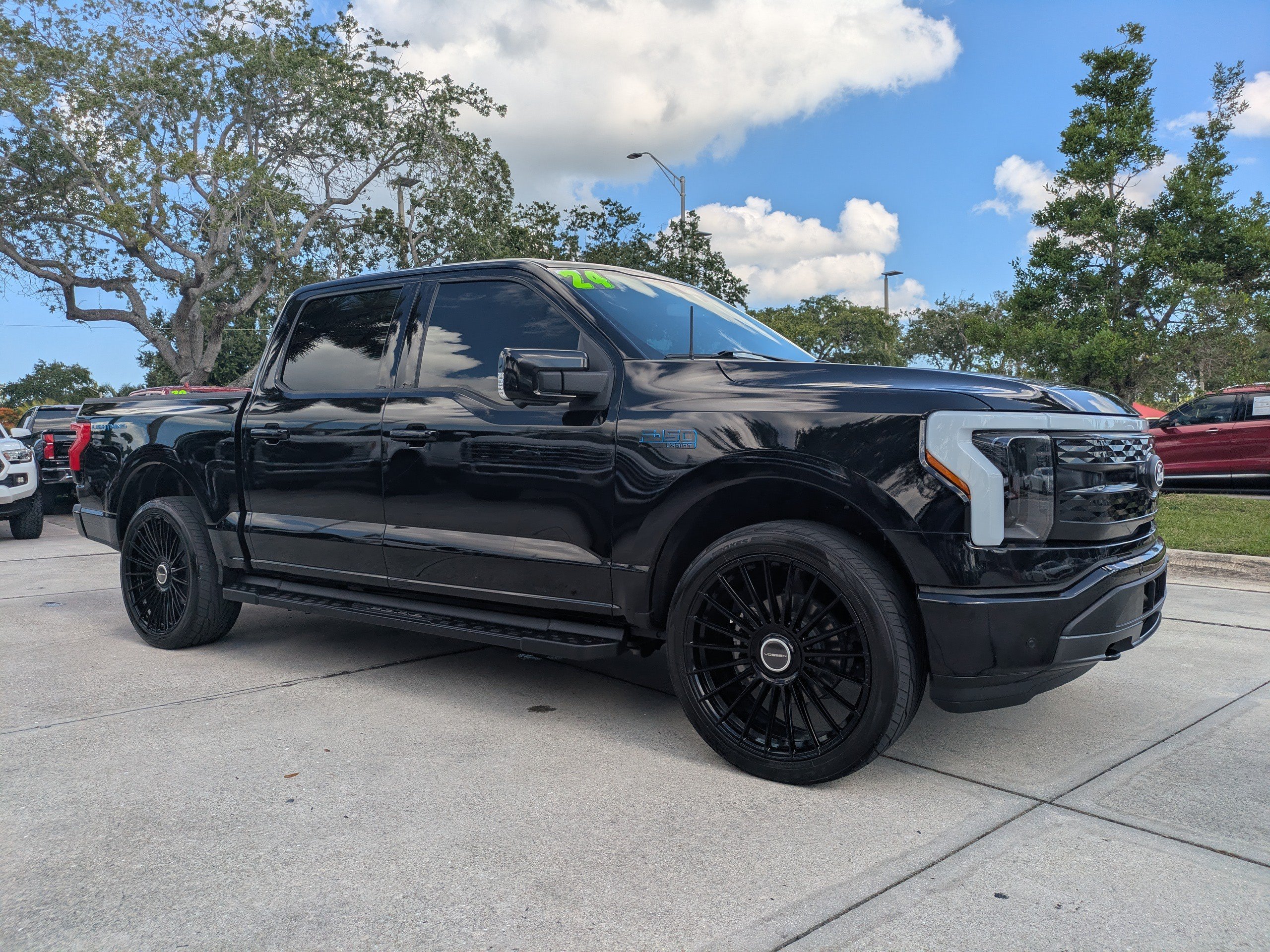 Used 2024 Ford F-150 Lightning Lariat with VIN 1FT6W5L78RWG20992 for sale in Naples, FL