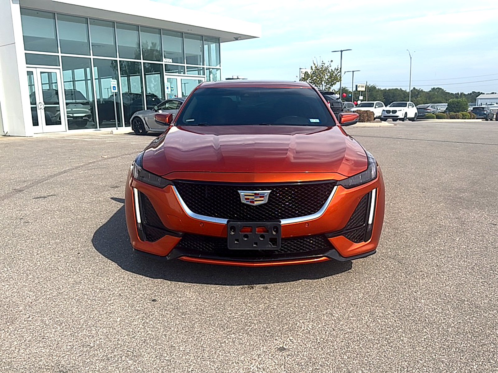 Used 2022 Blaze Orange Metallic Cadillac Sport image 2