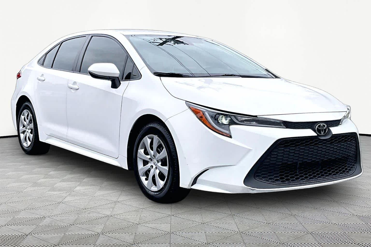 Used 2021 Super White Toyota LE image 3