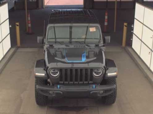 Used 2022 Jeep Wrangler Unlimited Rubicon 4XE with VIN 1C4JJXR60NW218509 for sale in Kansas City