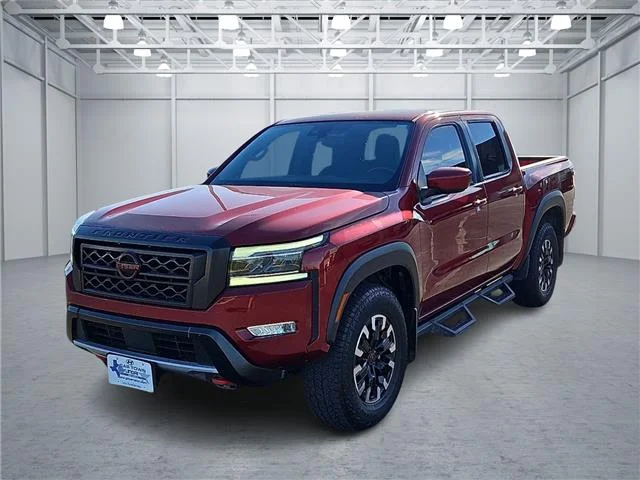 Used 2024 Red Nissan PRO-4X (A9) 4x4 Crew Cab 5 ft. box 126 in. WB image 1