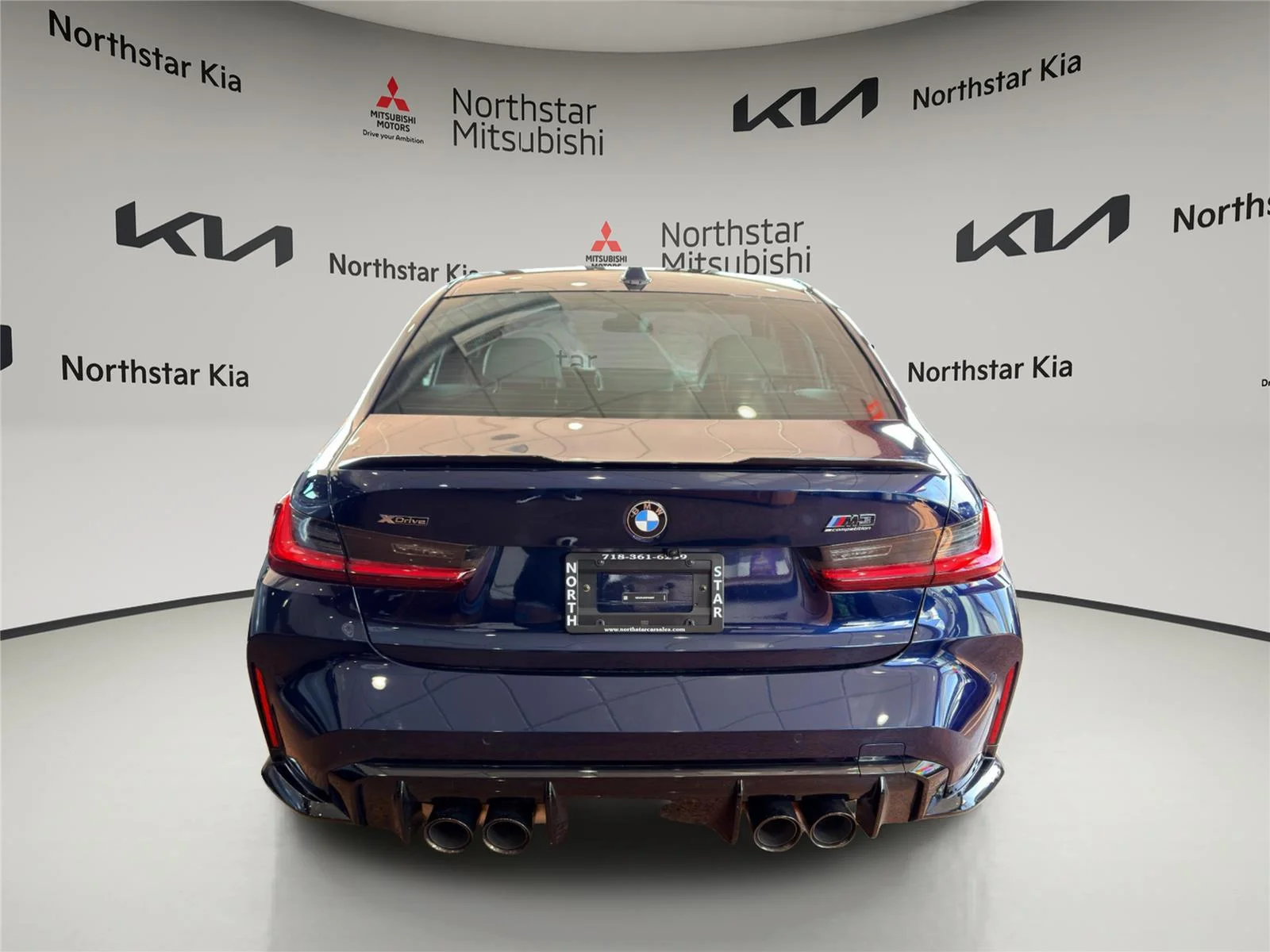 Used 2025 Tanzanite Blue II Metallic BMW Competition xDrive image 3