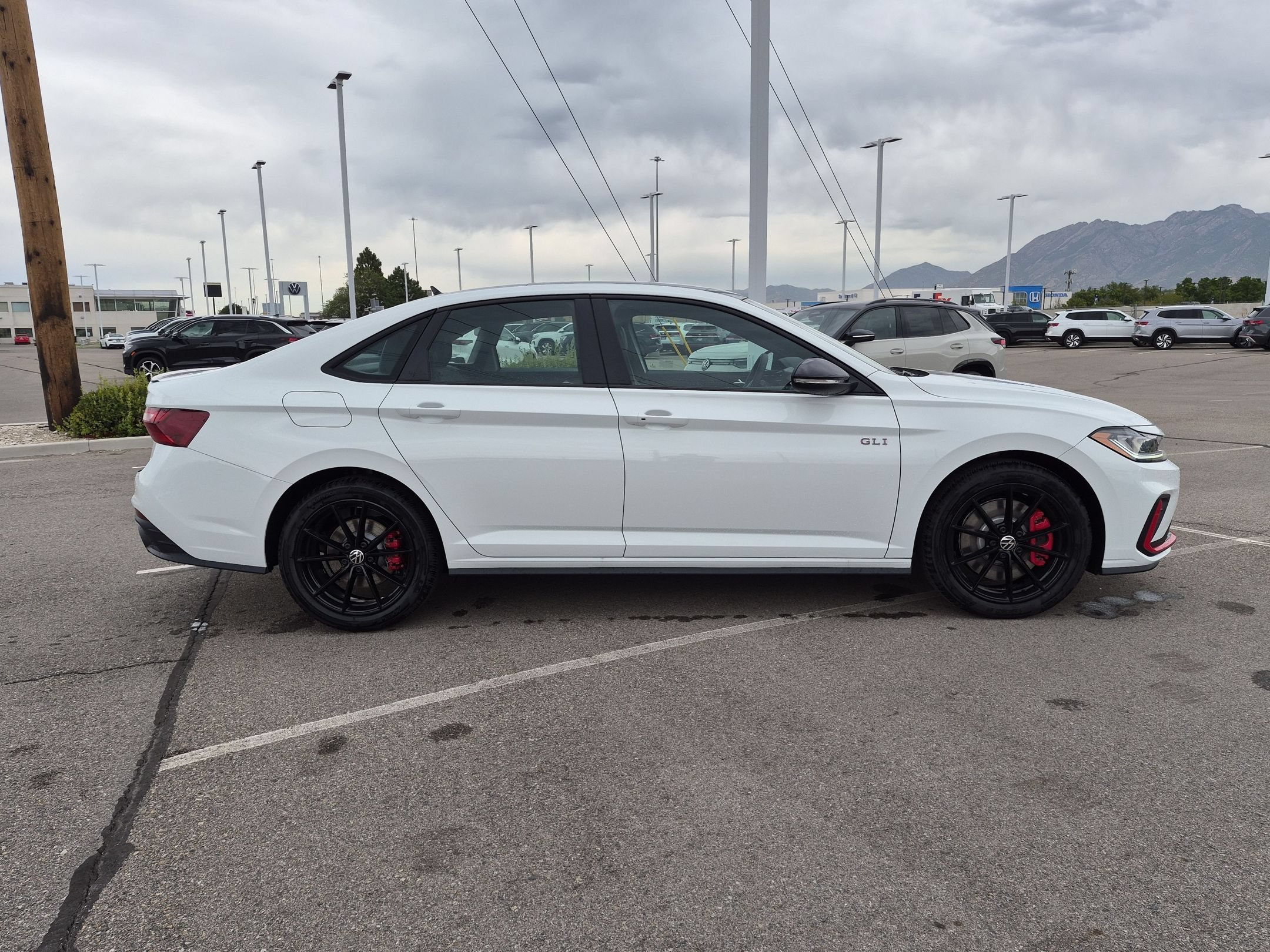 New 2026 Pure White w/Deep Blk Rf Volkswagen Autobahn image 2