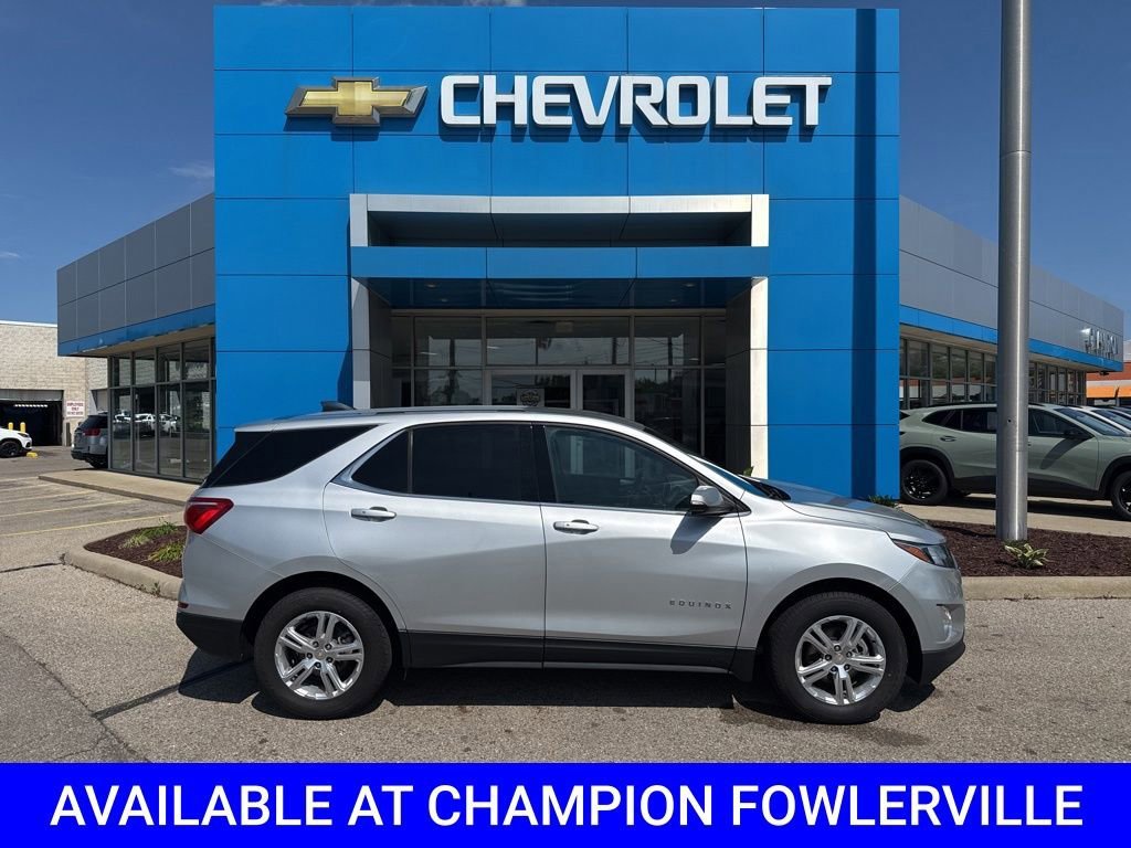 Used 2018 Chevrolet Equinox LT with VIN 2GNAXJEV1J6299458 for sale in Fowlerville, MI