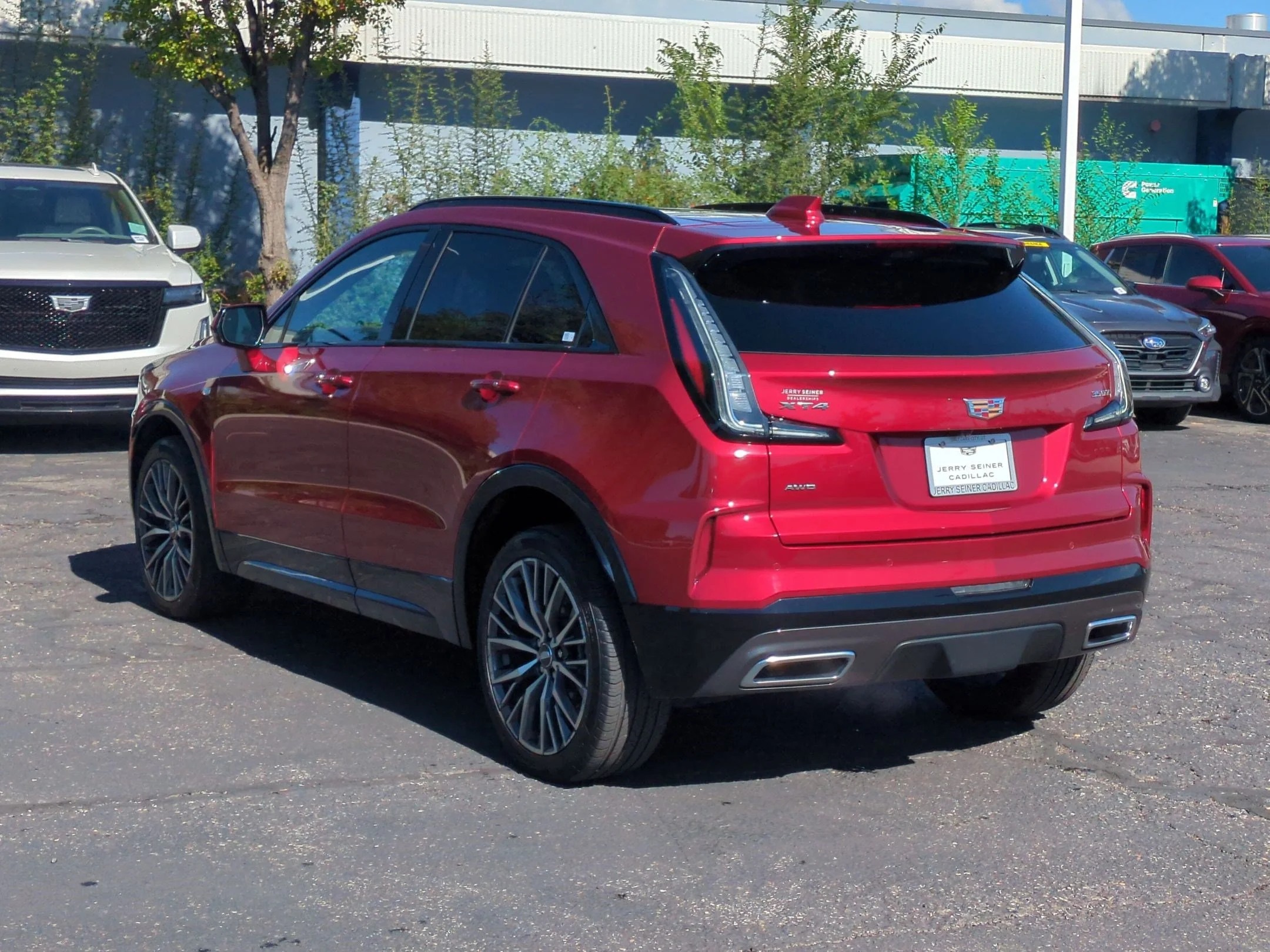 Used 2024 Radiant Red Tintcoat Cadillac AWD Sport image 3