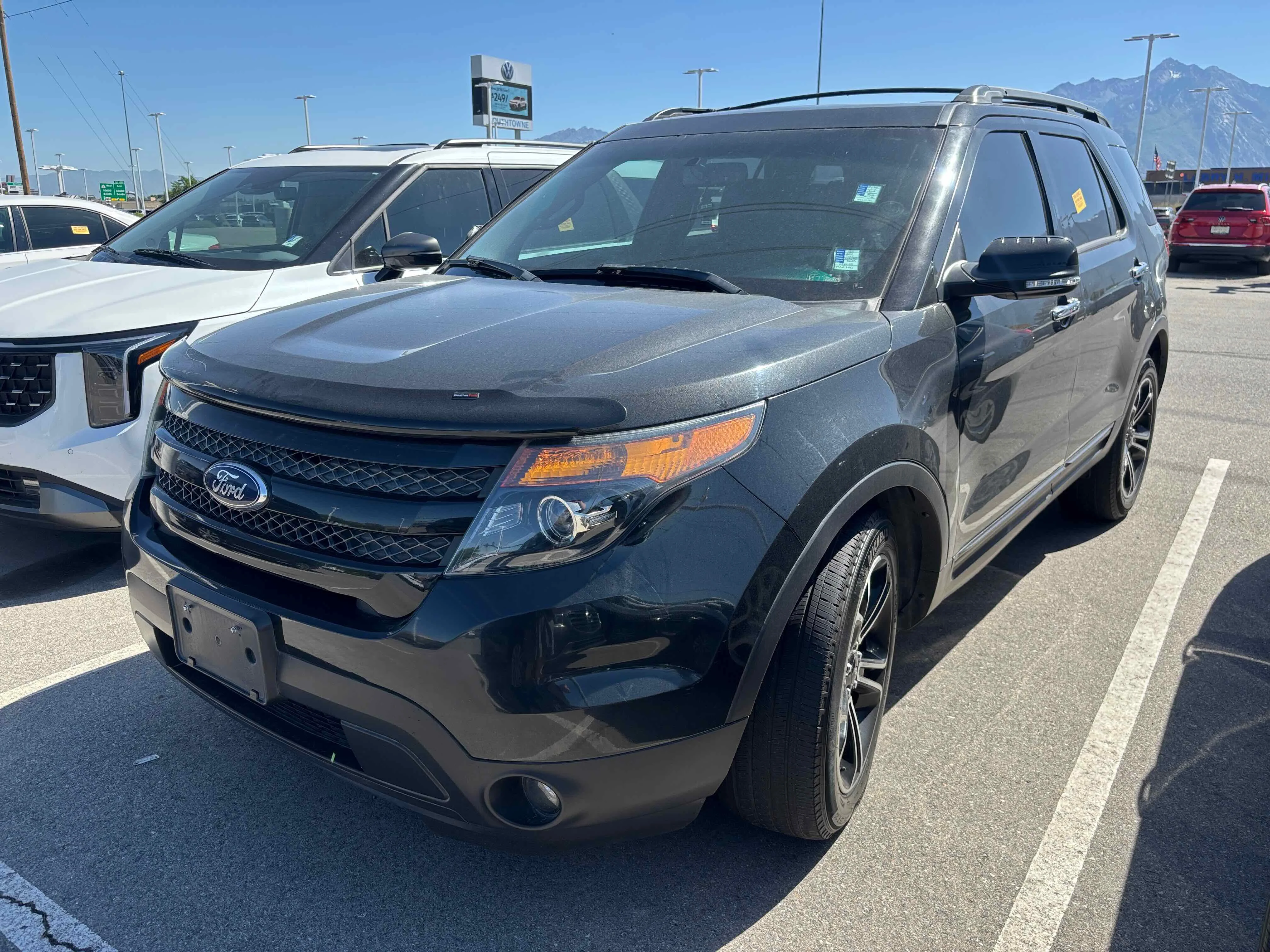 Used 2013 Black Ford Sport image 1