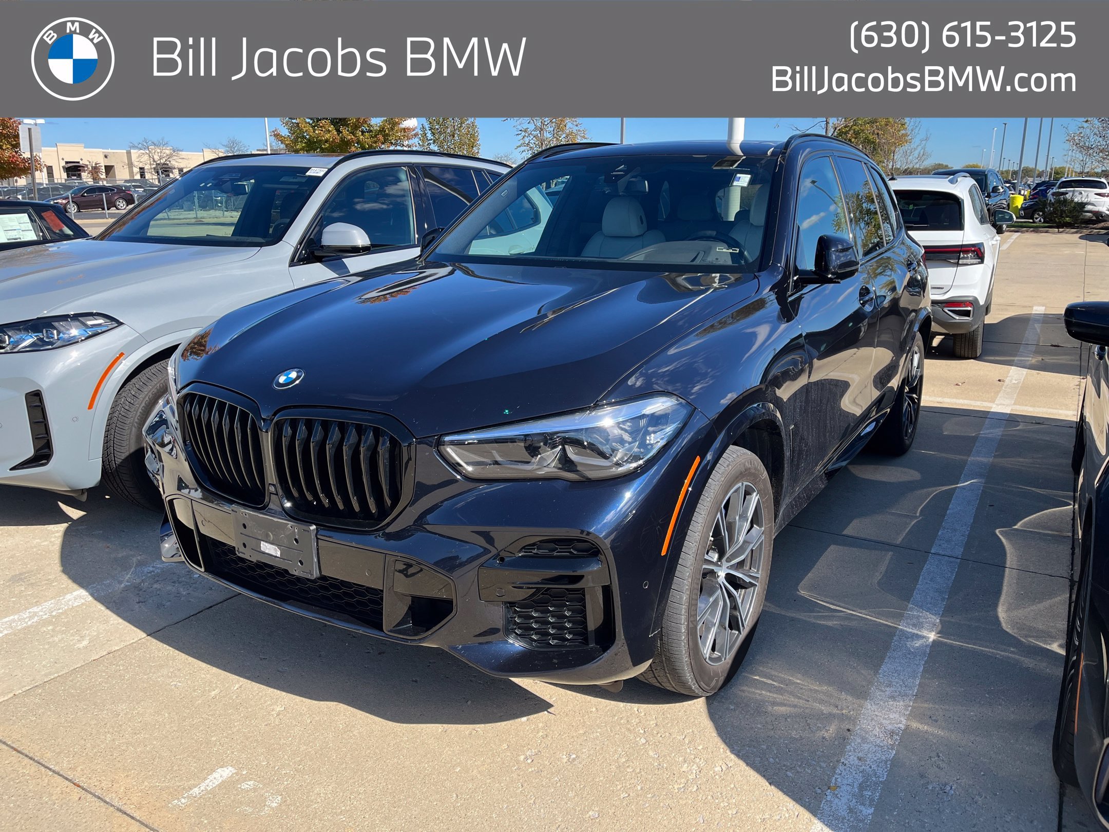 Used 2023 Carbon Black Metallic BMW xDrive40i image 1