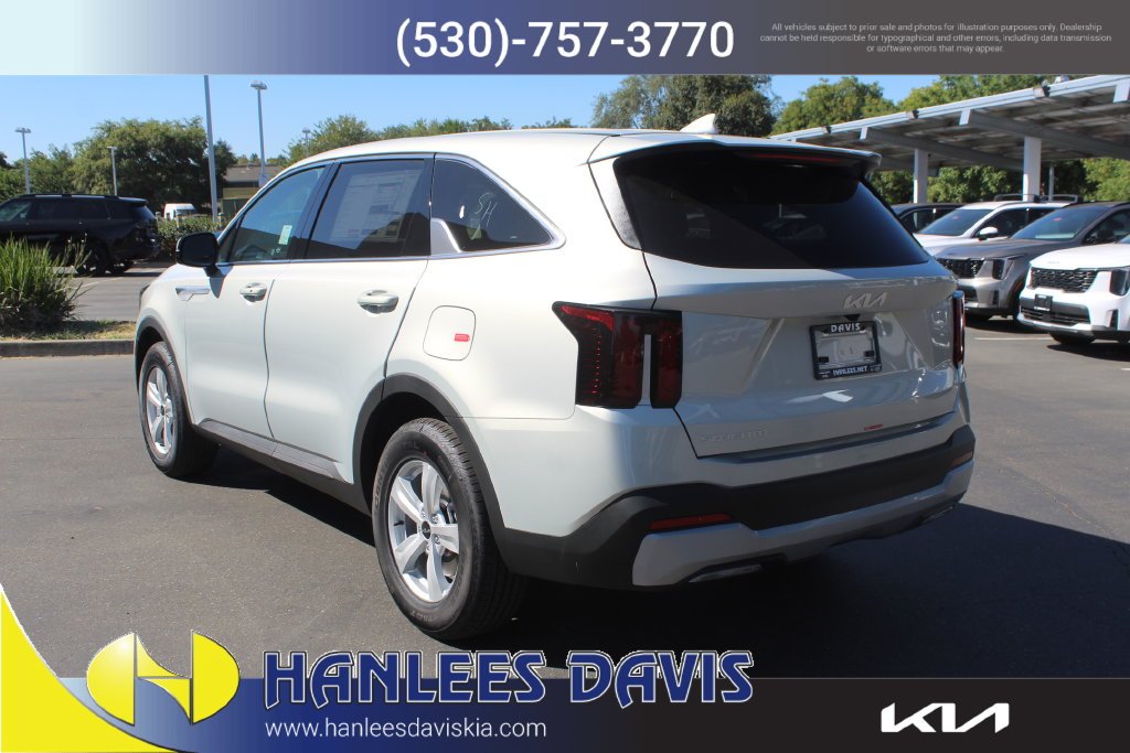 New 2026 Ivory Silver Kia LX image 9
