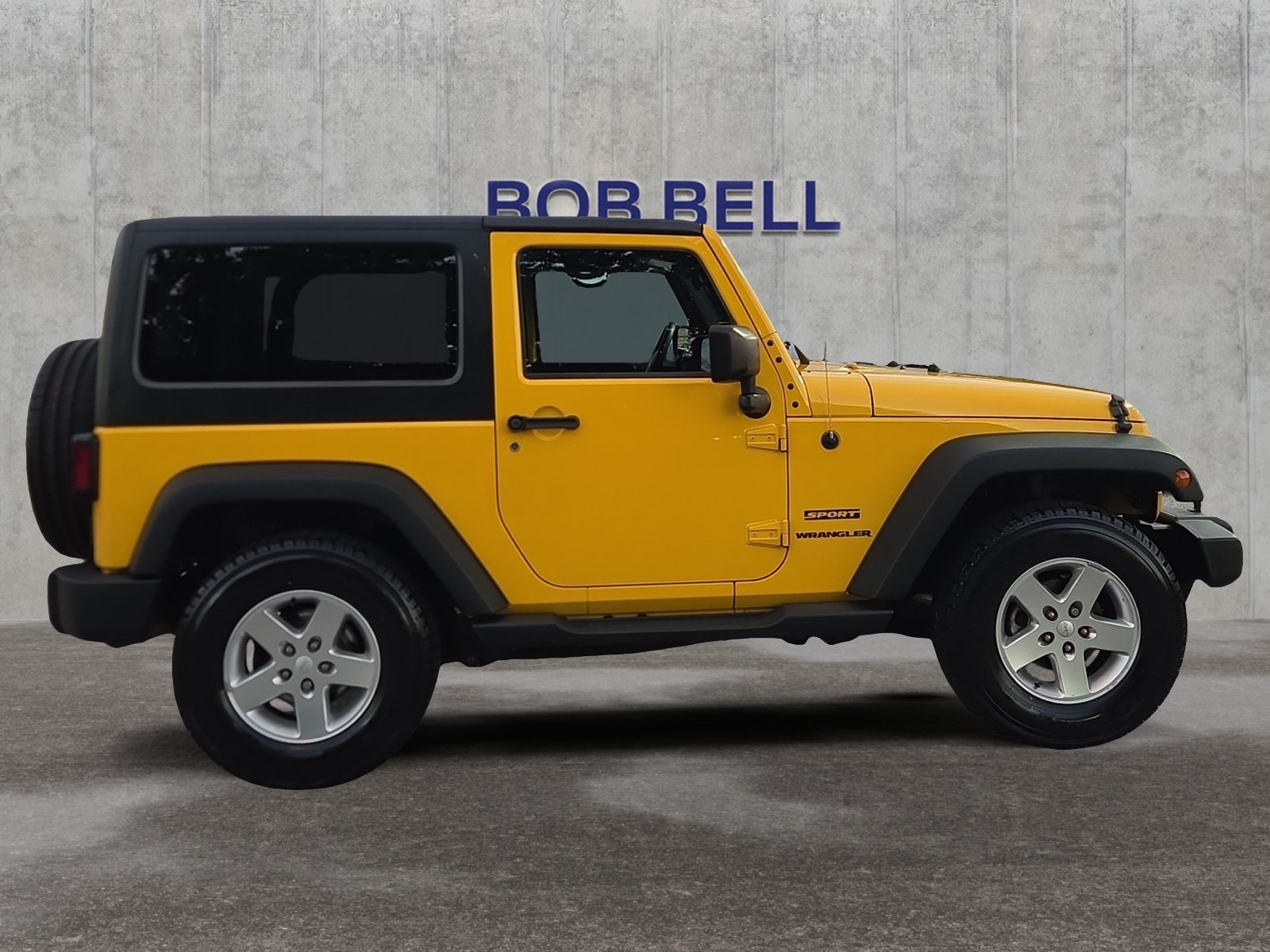 Used 2015 Baja Yellow Clearcoat Jeep Sport image 6
