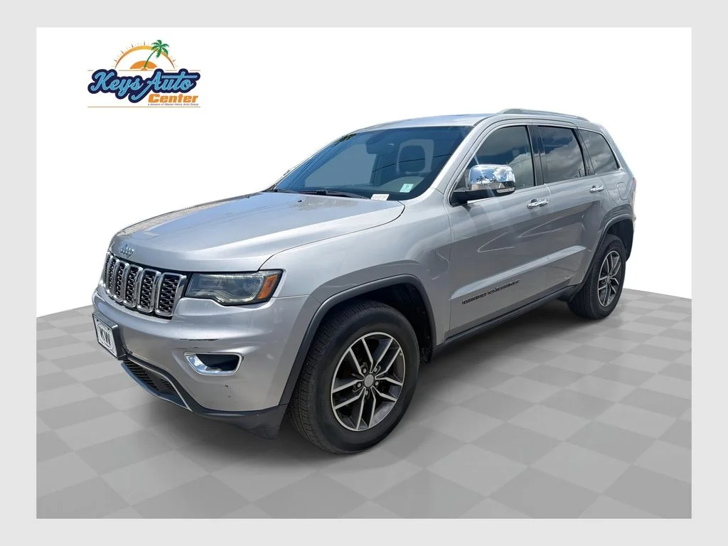 Used 2018 Billet Silver Metallic Jeep Limited image 1