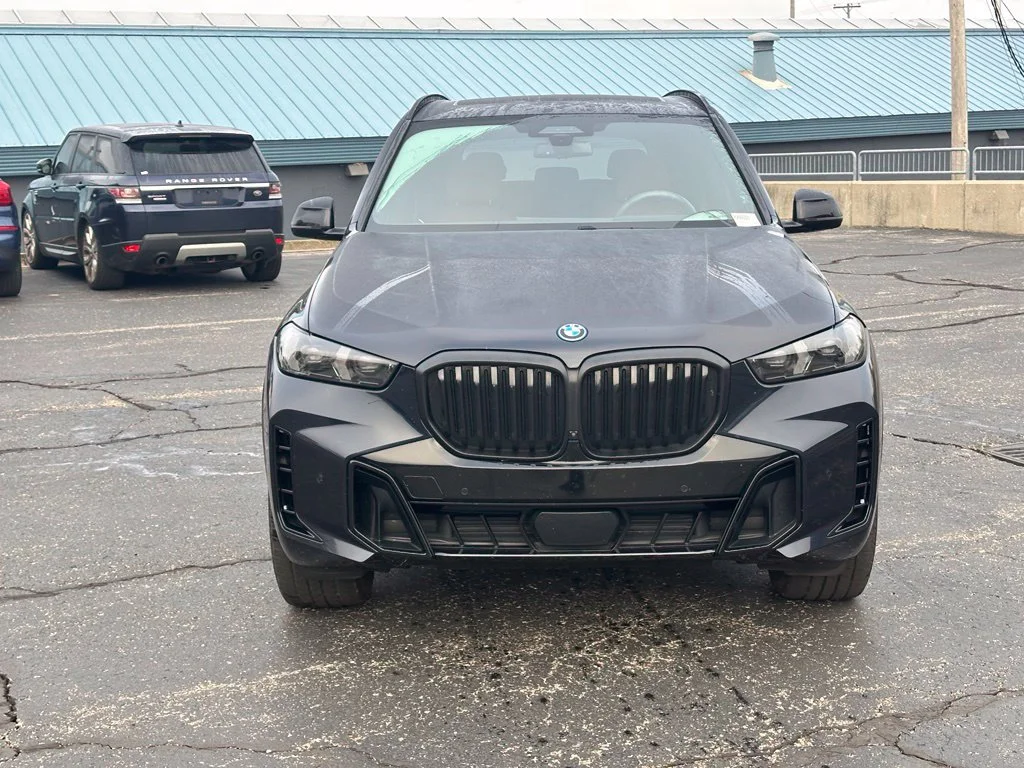 Used 2024 Carbon Black Metallic BMW xDrive50e image 2