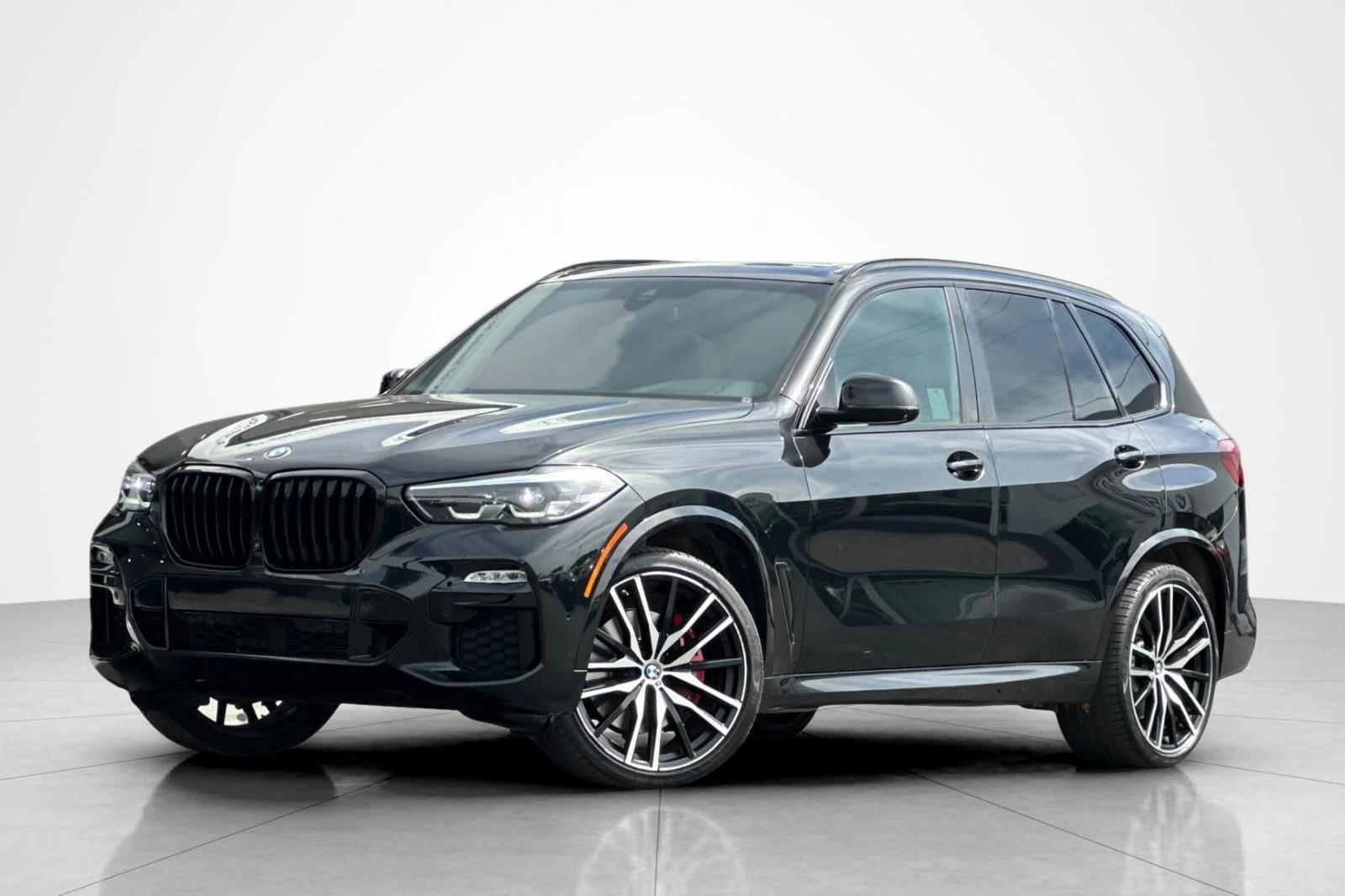 Used 2021 Black Sapphire Metallic BMW sDrive40i image 1