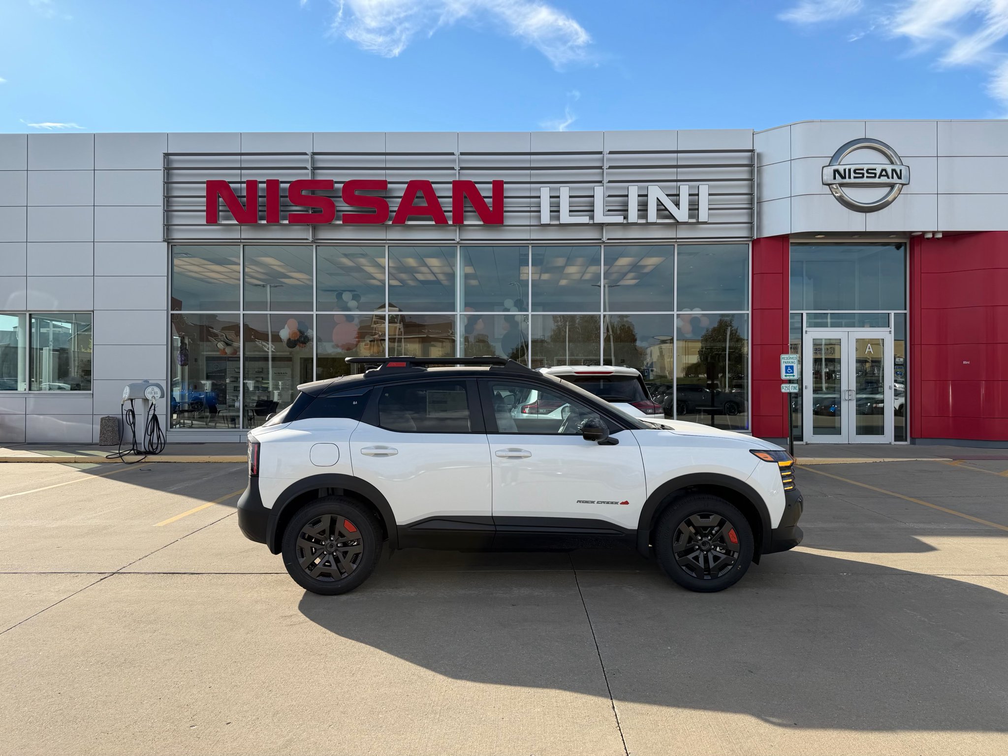 New 2027 Aspen White TriCoat / Super Black Two-tone Nissan Rock Creek® image 1