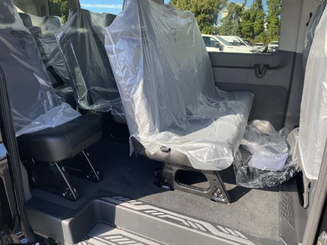 New 2027 Agate Black Metallic Ford Passenger Van XL image 7