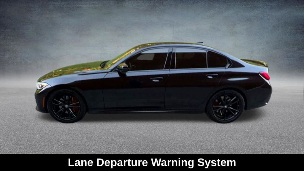 Used 2021 Black BMW M340i xDrive image 14