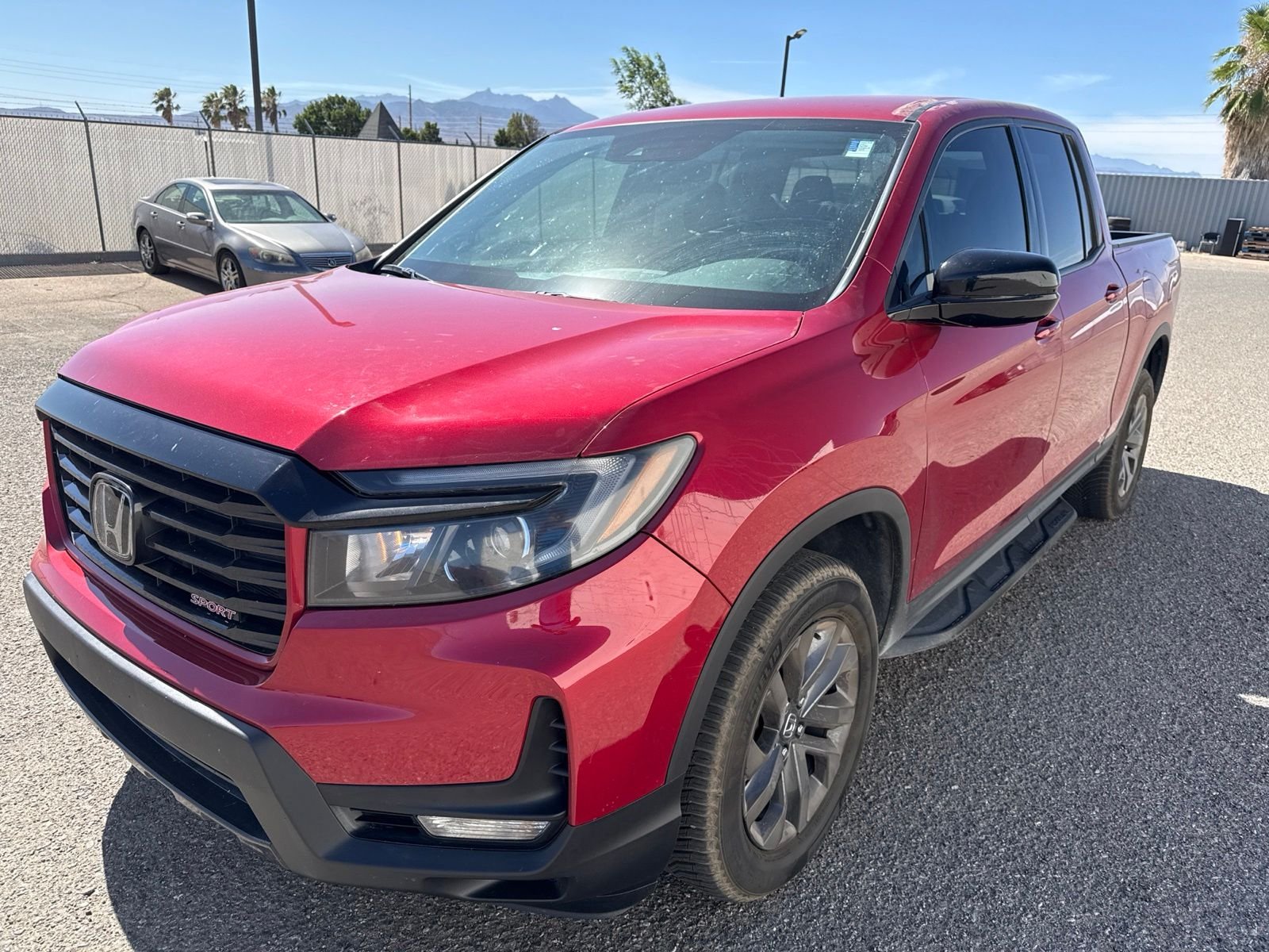 Certified Used 2021 Radiant Red Metallic II Honda AWD SPORT image 1