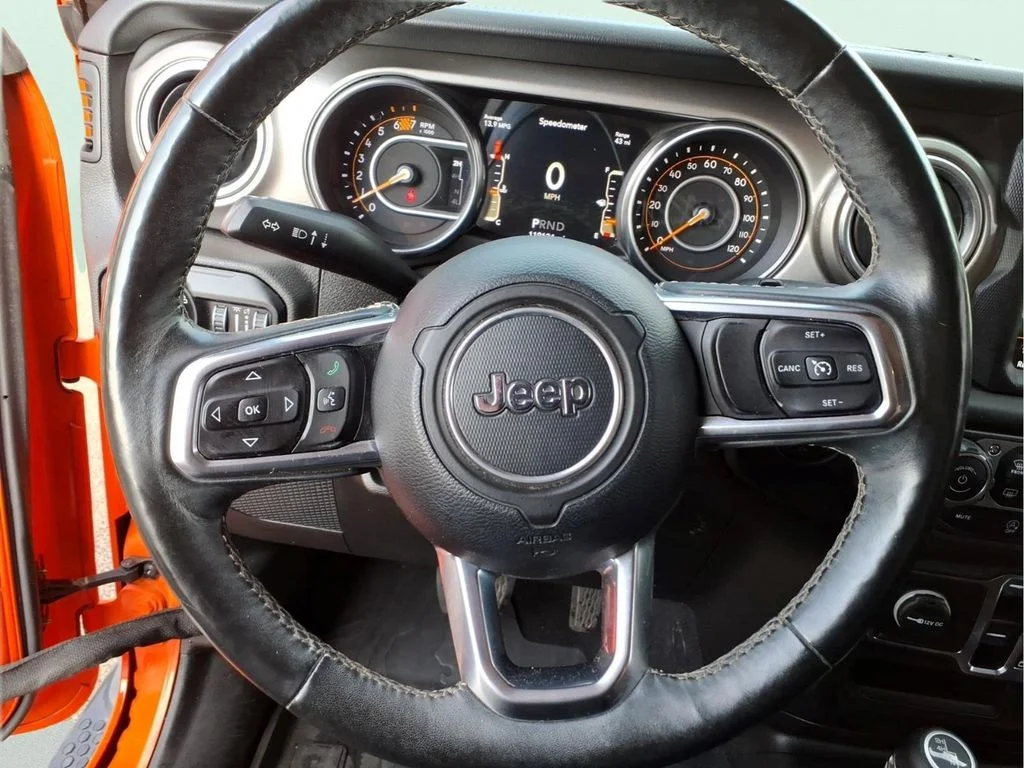 Used 2018 Orange Jeep Unlimited Sahara image 18