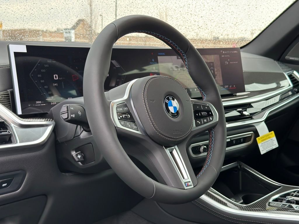 New 2026 Black Sapphire Metallic BMW M60i image 17