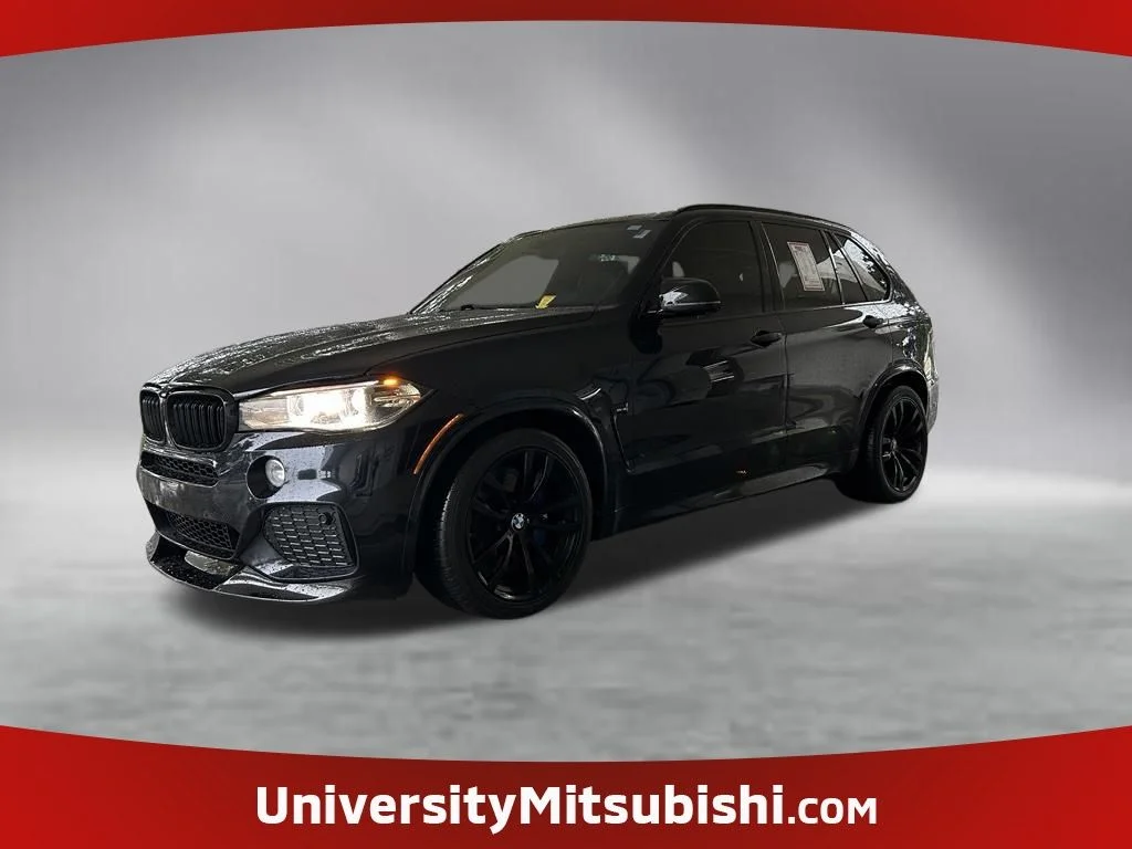 Used 2014 Black BMW xDrive50i image 1