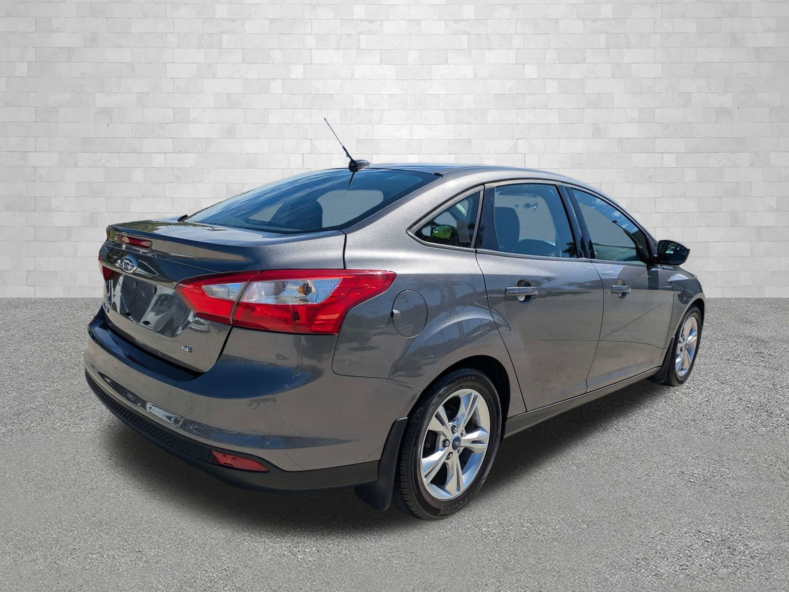 Used 2014 Ford Focus SE with VIN 1FADP3F24EL116370 for sale in Naples, FL