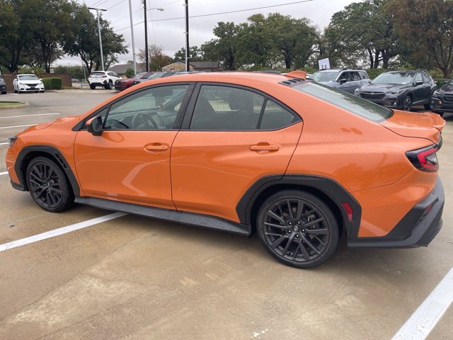 Used 2023 Solar Orange Pearl Subaru Premium image 4