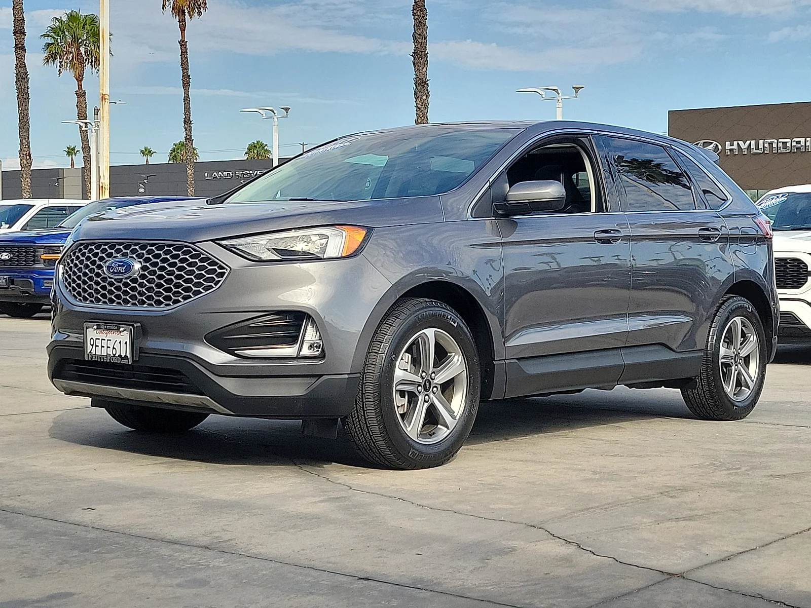 Certified Used 2023 Gray Metallic Ford SEL image 1