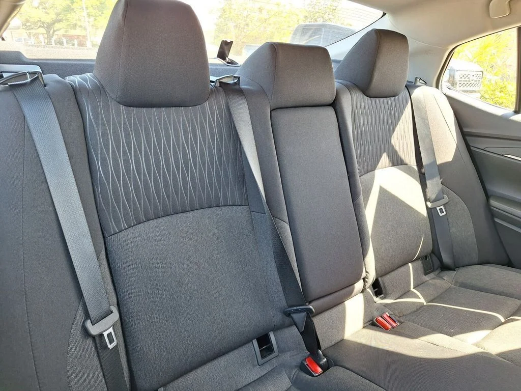 Used 2025 Midnight Black Metallic Toyota LE image 28
