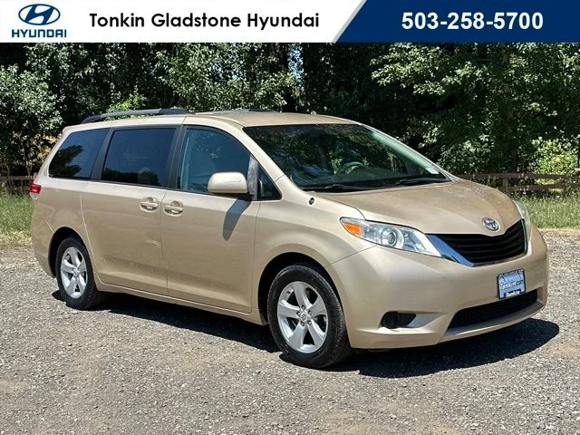 Used 2011 Sandy Beach Metallic Toyota LE image 1