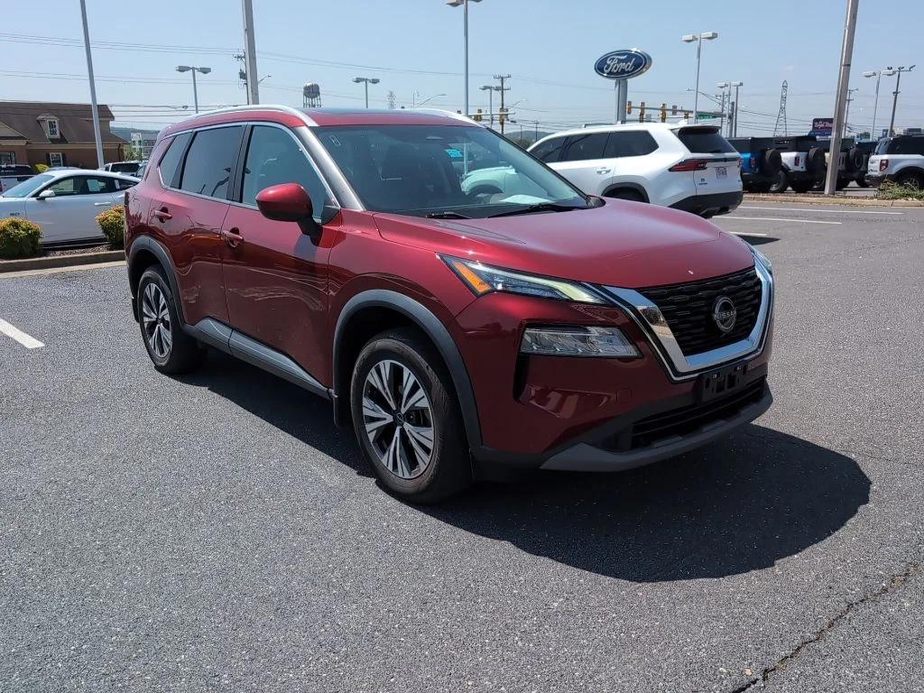 Certified Used 2023 Red Nissan SV image 1